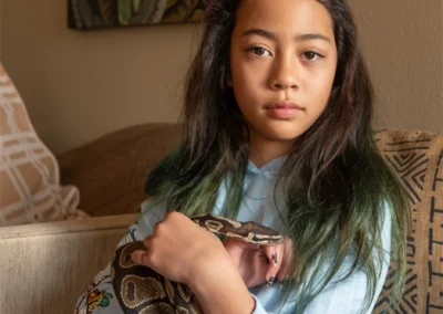 Kahaia holding snake