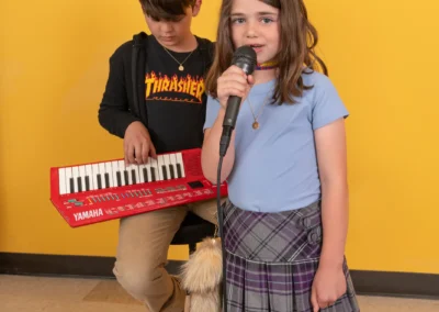 Calvin and Alma performing a song
