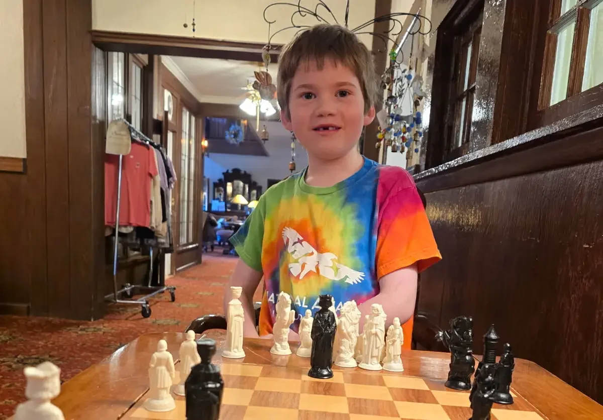 Student_Playing_Chess Student Playing Chess