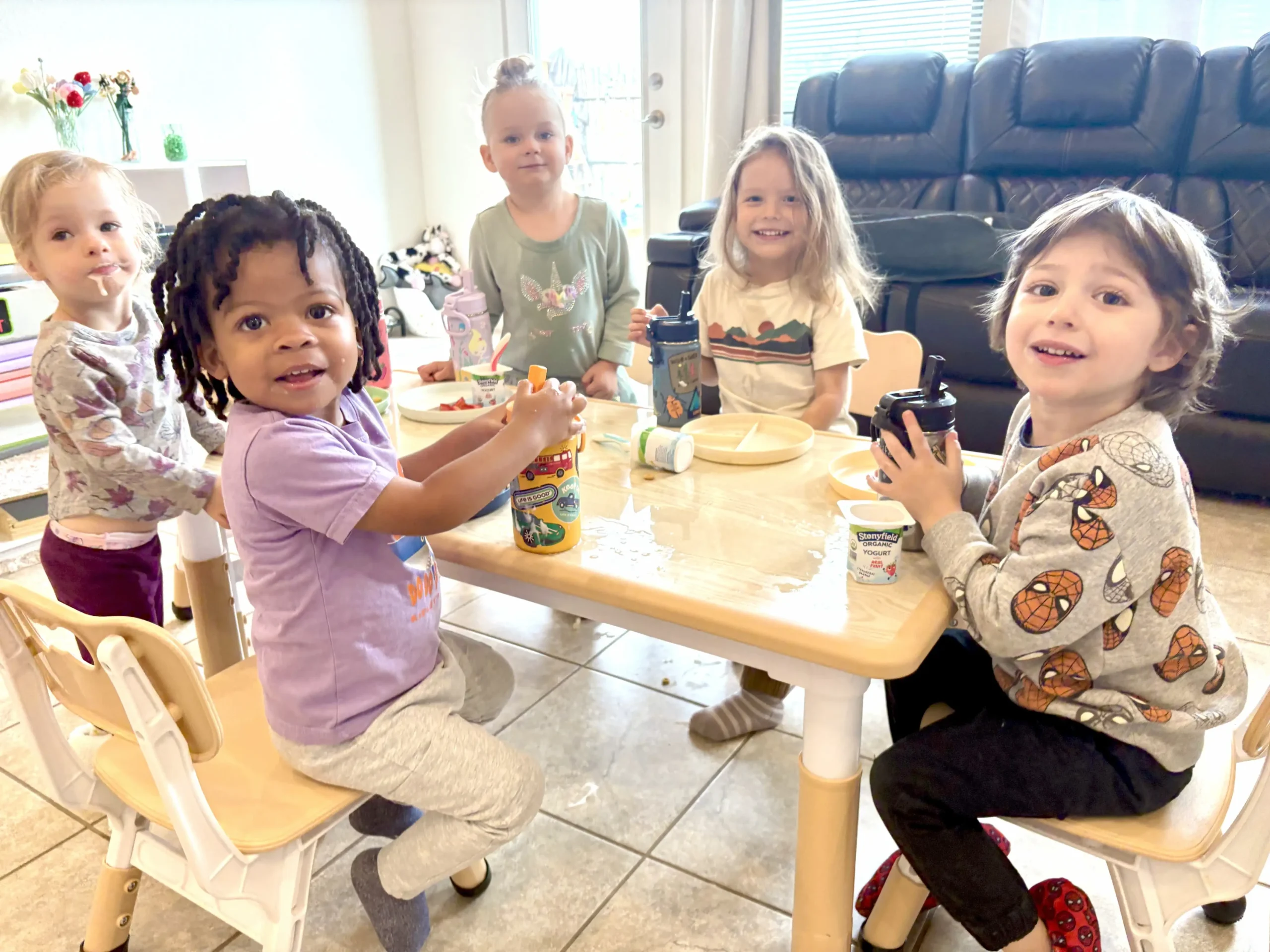 Courtesy photo: Students gather around the table to share breakfast and start the day.