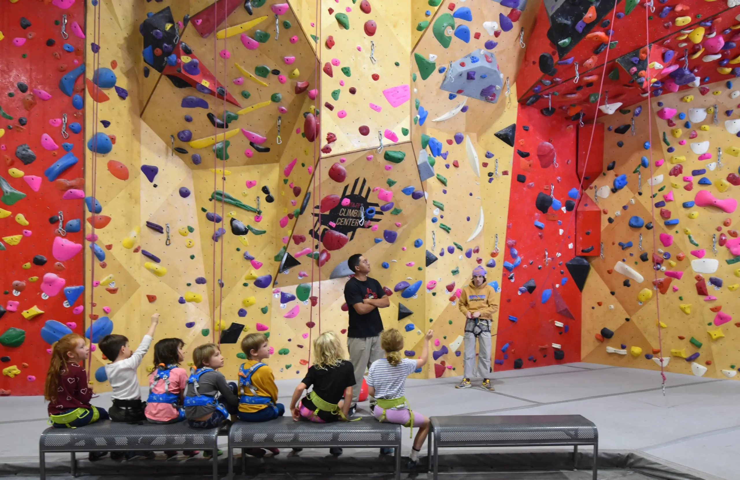 Aidan and Jahbran get the young climbers ready for “the big swing!” safety first. 